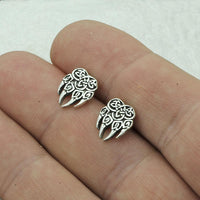 Pendientes nórdicos celtas con pata de lobo Triquetra