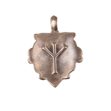 Colgante de máscara vikinga de bronce