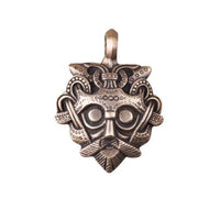 Colgante de máscara vikinga de bronce
